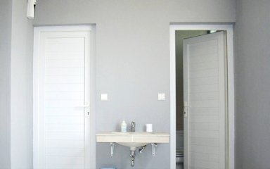 تفاوت درب تمام PVC و درب روکش PVC: راهنمای تشخیص درب ضد آب واقعی